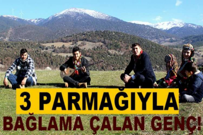 3 parmağıyla bağlama çalan genç, usta sanatçılara taş çıkartıyor