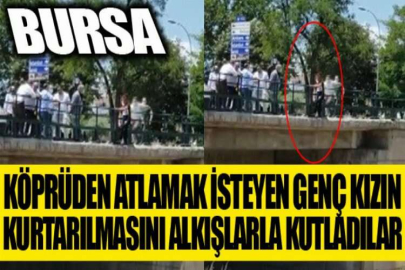 Köprüden atlamak isteyen genç kızın kurtarılmasını alkışlarla kutladılar
