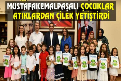 Mustafakemalpaşalı çocuklar atıklardan çilek yetiştirdi