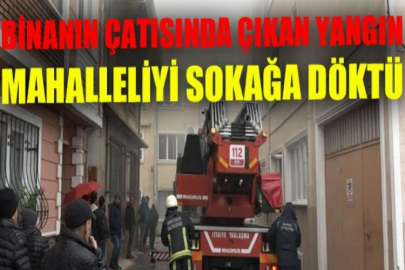 Bitişik nizam binanın çatısında çıkan yangın, mahalleliyi sokağa döktü