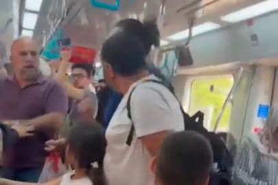 Marmaray'da çocuklarının yanında babaya yumruk