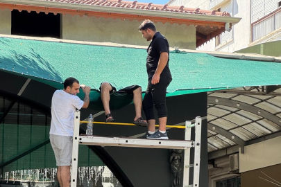 Balkondan dengesini kaybedip düştü! Hayatını tente kurtardı