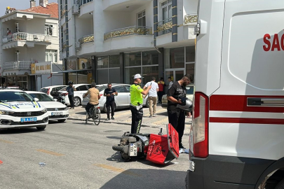 Otomobil ile Çarpışan Motokurye Yola Savrularak Yaralandı