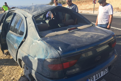 Kazada taklalar atan araçta bulunan çift şans eseri yara almadan kurtuldu