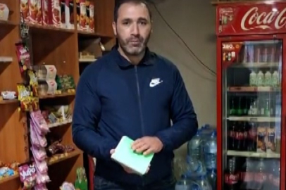 Mahallelinin borcunu kapattı, veresiye defterini sobaya attı