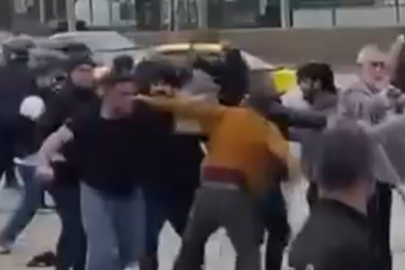 Taşlar, sopalar, yumruklar havada uçuştu: İki grup arasındaki kavgada ilginç kareler