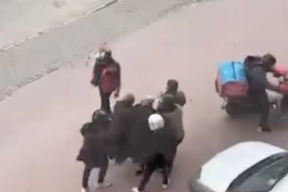 Lodosa yakalanan yaşlı kadını motosikletli kuryeler korudu