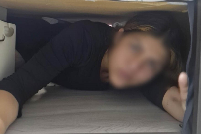 Baza altında yakalandı