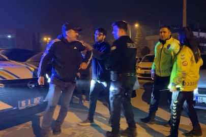 Babası kaputun üstünde oturup polise direndi