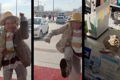 Fark ücreti vermek istemeyen kadın eczaneye taşla saldırdı