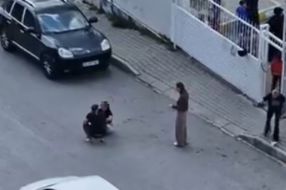 Sokak ortasında karısını darbetti