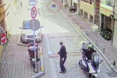 Pencereye çıkan şahıs dengesini kaybederek beton zemine düştü: O anlar kameraya yansıdı