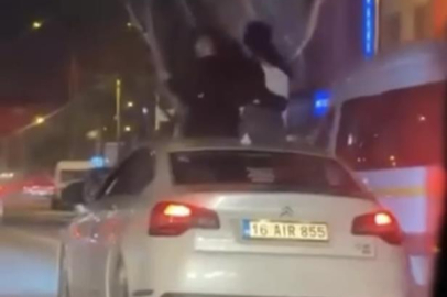 Bursa'da otomobilin tavanına oturdular : 25 bin TL ceza kesildi