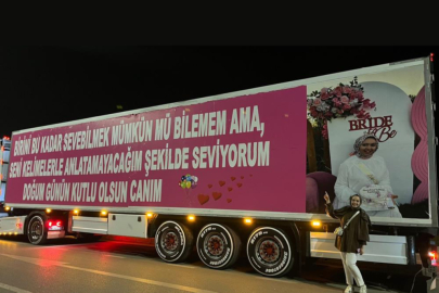 Eşinin doğum günü için 25 metrelik tırı kapladı
