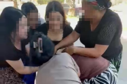 Genç kadını çocuğunun yanında hem dövdüler hem de videoya çektiler