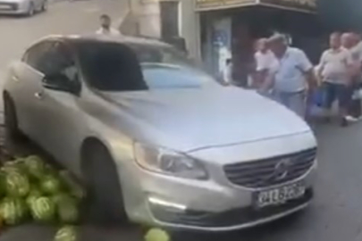 Lüks aracıyla pazar tezgahına daldı