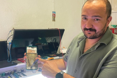 Cep telefonu bomba gibi patlayıp alev aldı