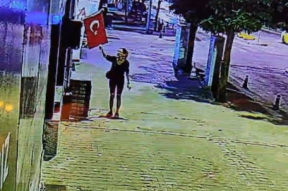 Muğla'da bir kadın sabaha karşı bir dükkanda asılı Türk bayrağı çakmakla yakmaya kalktı