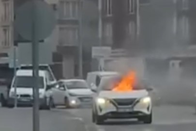 Polis memuru alevlere koştu: O anlar kamerada