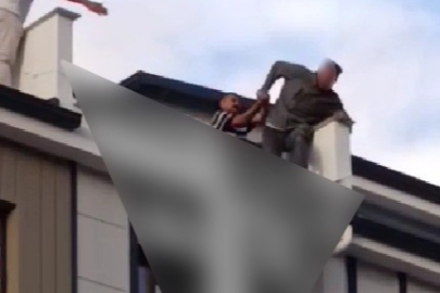 Eşiyle tartışıp çatıya çıkan genci Başkan son anda çekip aldı