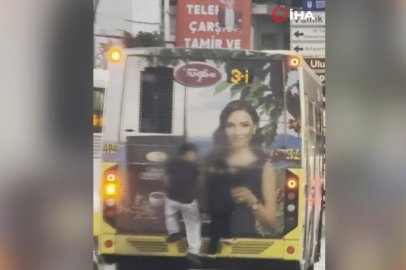 Bursa'da otobüsün arkasında tehlikeli yolculuk