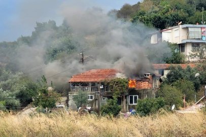 Benzin ile ocakta odun yakmak isterken evi yaktı