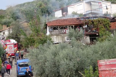 Benzinle odun yakmak isterken yangın çıktı