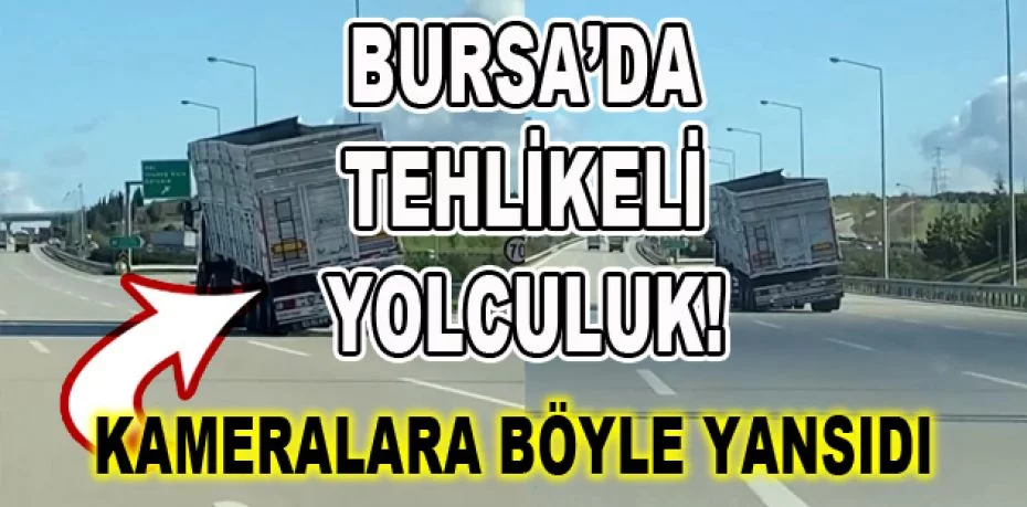Bursa'da dorsesi yan yatmış tırın tehlikeli yolculuğu kamerada