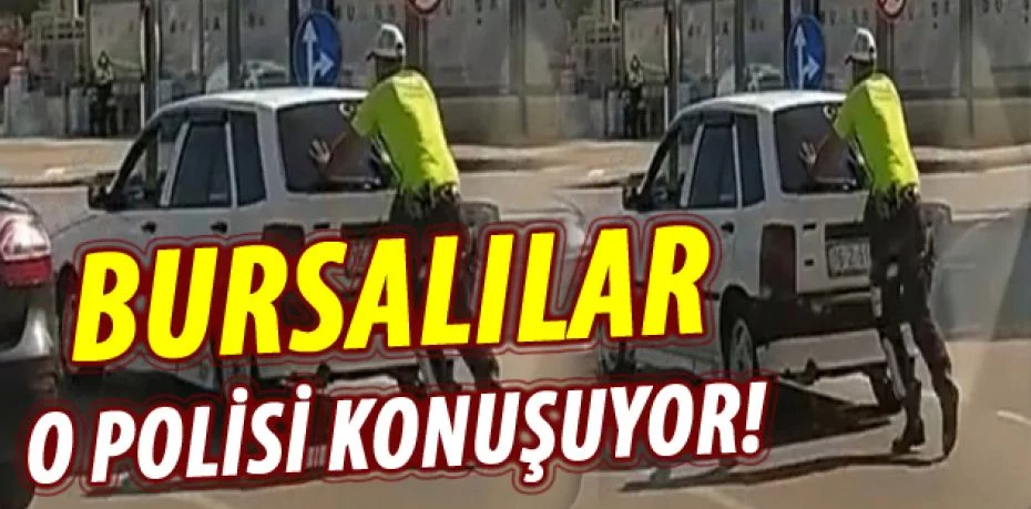 Bursa'da yolda kalan otomobili iterek sürücüye yardım etti!