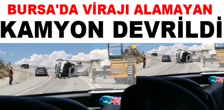 Bursa'da virajı alamayan kamyon devrildi