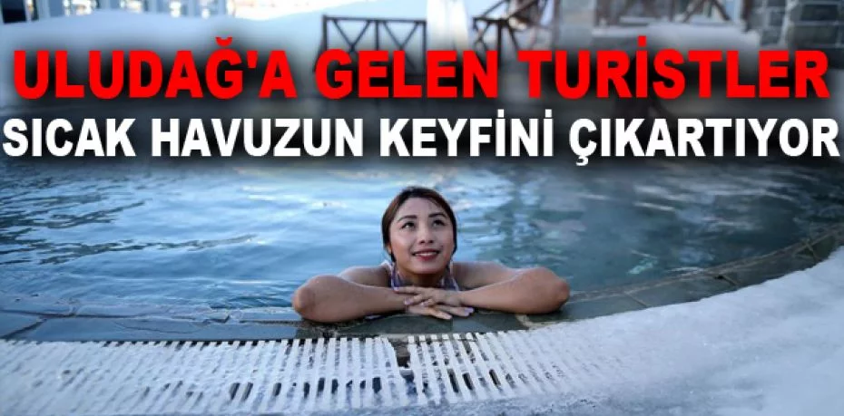 Uludağ'a gelen turistler dondurucu soğukta sıcak havuzun keyfini çıkartıyor