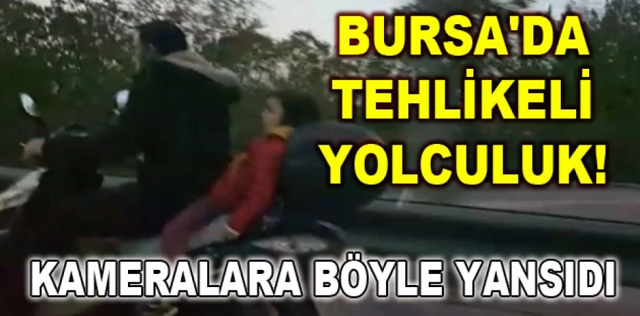 Bursa'da motosiklet üzerinde tehlikeli yolculuk kamerada!