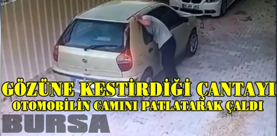 Bursa’da gözüne kestirdiği çantayı otomobilin camını patlatarak çaldı